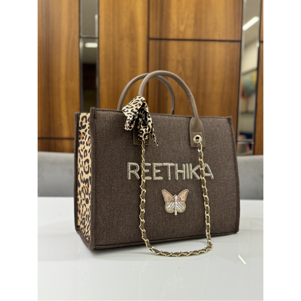 SHOE POCKET BROWN CHEETAH 