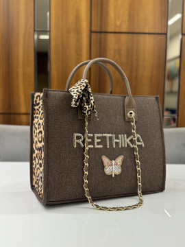 SHOE POCKET BROWN CHEETAH 