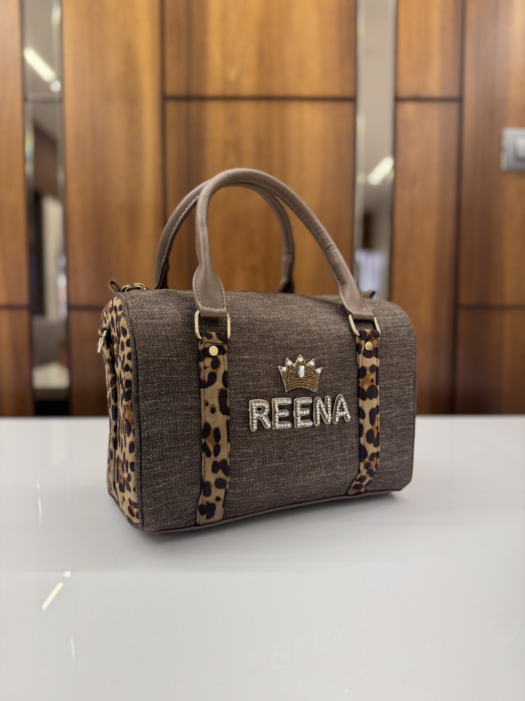 MINI SLING DUFFLE BROWN CHEETAH